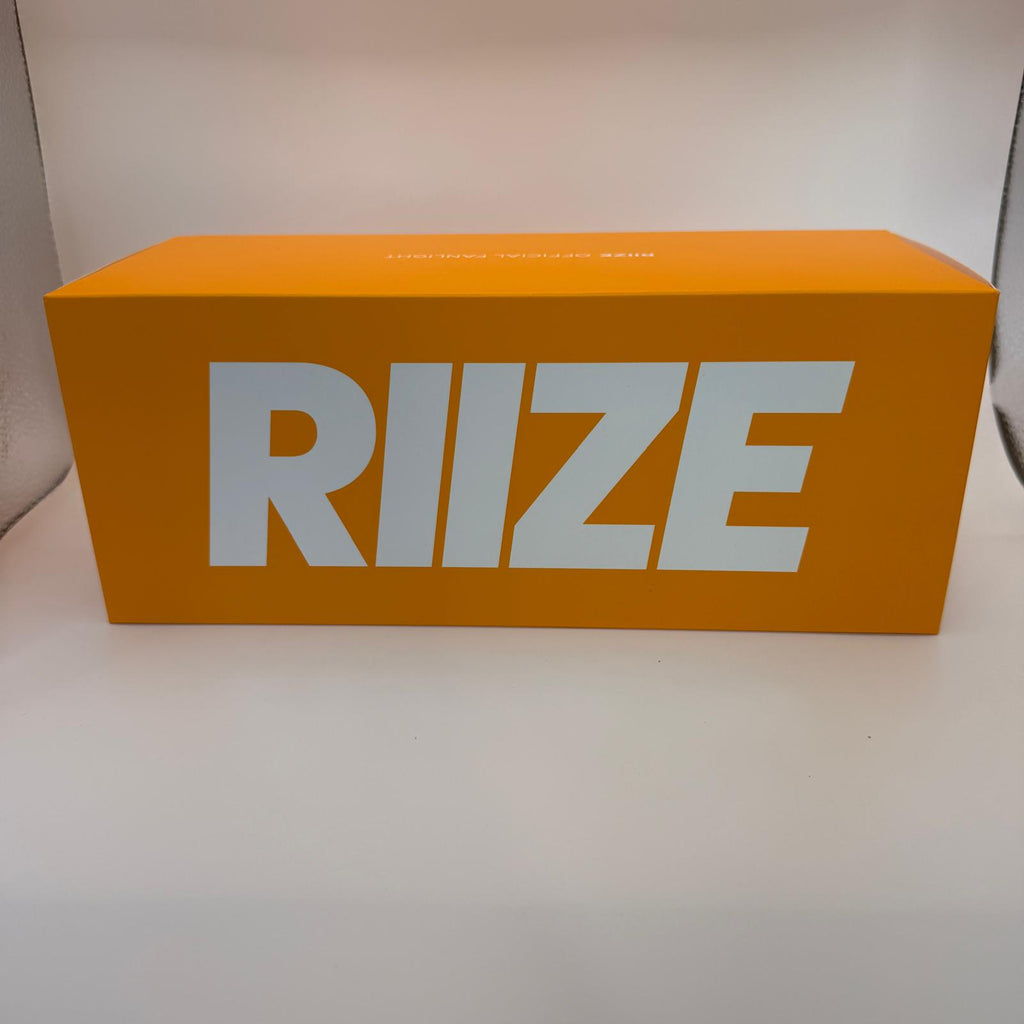 RIIZE Official Light Stick orange retail box – front view