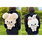 Stray Kids SKZOO plush backpacks worn outdoors — PuppyM and Leebit, sold individually