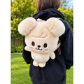 Stray Kids SKZOO PuppyM plush backpack worn outdoors